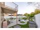 Outdoor patio with a pool view featuring a seating area and well-maintained landscaping at 2226 E Parkside Ln, Phoenix, AZ 85024