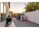 Private side yard featuring a grill, shed, playhouse, and manicured paver stones at 2226 E Parkside Ln, Phoenix, AZ 85024