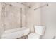 Bathroom featuring tiled shower over tub, with a mosaic tile accent at 2402 E 5Th St # 1403, Tempe, AZ 85288