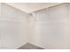 Walk-in closet with carpet flooring and wood shelving at 2402 E 5Th St # 1403, Tempe, AZ 85288