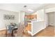 Bright dining room featuring a glass table, stainless appliances, and ample space for gatherings at 3147 E Michigan Ave, Phoenix, AZ 85032