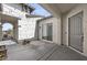 Cozy covered patio area with string lights, perfect for outdoor dining and entertaining at 3539 E Starflower Dr, Queen Creek, AZ 85142