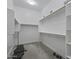 Walk-in closet with white walls, carpet and shelving at 3539 E Starflower Dr, Queen Creek, AZ 85142