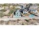 Aerial view of home with solar panels, swimming pool, and well-manicured landscaping at 3553 N 292Nd Dr, Buckeye, AZ 85396