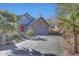 Charming home featuring desert landscaping, a stone facade, and a two-car garage at 3553 N 292Nd Dr, Buckeye, AZ 85396