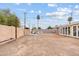 This spacious backyard is ready for fun with a large lot, string lights, and lounge chairs at 3718 E Sheridan St, Phoenix, AZ 85008