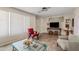 This elegant living room is bathed in natural light and features stylish furnishings at 3718 E Sheridan St, Phoenix, AZ 85008