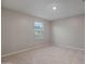 Bedroom with neutral walls and carpet, and natural light from a window at 3911 S 79Th Ln, Phoenix, AZ 85043