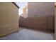 This backyard has an attractive privacy wall and low maintenance yard at 3911 S 79Th Ln, Phoenix, AZ 85043