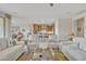 Spacious living room looking into the gourmet kitchen with ample seating at 3956 N San Marin Dr, Florence, AZ 85132