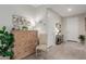 Inviting entryway featuring light wood-look flooring, a console table, and tasteful decor creates a welcoming ambiance at 4107 N Hawthorn Dr, Florence, AZ 85132