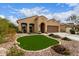 Inviting single-story home with desert landscaping, an attached two-car garage, and a well-maintained front yard at 4107 N Hawthorn Dr, Florence, AZ 85132