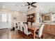 Dining room with a wooden table, seating for six, and ceiling fan at 4217 E Edgemont Ave, Phoenix, AZ 85008