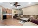 Inviting Gathering room featuring hardwood floors, a wet bar, and comfortable seating at 4217 E Edgemont Ave, Phoenix, AZ 85008