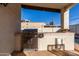 A built-in stainless steel grill and countertop on the patio, perfect for outdoor cooking at 4217 E Edgemont Ave, Phoenix, AZ 85008