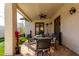 Patio dining area with ceiling fan, set for six, and a heater for cool evenings at 4217 E Edgemont Ave, Phoenix, AZ 85008