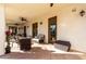 Outdoor patio area featuring a seating area, ceiling fans, and flagstone flooring at 4217 E Edgemont Ave, Phoenix, AZ 85008