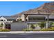 A view of the community entrance with sign reading San Tan Groves and mountain views at 4340 W Jeanette Ln, San Tan Valley, AZ 85144