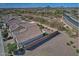 Stunning aerial view of a single Gathering home with a private yard, mountain views, and desert landscaping at 4424 N Potomac Dr, Florence, AZ 85132