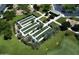 Aerial shot of a bocce ball court area with well-maintained landscaping and shading structures at 4424 N Potomac Dr, Florence, AZ 85132