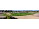 Picturesque golf course view with a water feature and well-maintained fairways at 4424 N Potomac Dr, Florence, AZ 85132