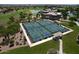 Aerial view of pickleball courts surrounded by mature landscaping at 4424 N Potomac Dr, Florence, AZ 85132