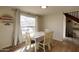 Dining area with big window and wood floors at 4606 W Continental Dr, Glendale, AZ 85308