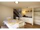 Cozy dining area with built in hutch with granite countertop and wood floors at 4606 W Continental Dr, Glendale, AZ 85308