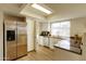 Bright kitchen featuring stainless steel appliances, wooden floors, and lots of storage at 4606 W Continental Dr, Glendale, AZ 85308