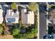 Aerial view of a home featuring solar panels, mature trees, and a well-maintained yard at 4741 W Kristal Way --, Glendale, AZ 85308