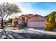 Charming single Gathering home featuring desert landscaping, a tile roof, and a two car garage at 4741 W Kristal Way --, Glendale, AZ 85308