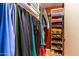 Bright walk-in closet with shelves, rods, and neatly organized clothing, shoes, and accessories at 4741 W Kristal Way --, Glendale, AZ 85308