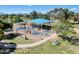 Beautiful aerial view of a park featuring a modern playground with sun protection at 5094 N 83Rd St, Scottsdale, AZ 85250