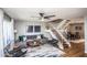 Inviting living room with a gray sectional sofa, stylish decor, and a staircase leading to the upper level at 5094 N 83Rd St, Scottsdale, AZ 85250