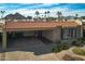 Charming single-story home with covered parking, desert landscaping, and a red tile roof at 5110 N 78Th St, Scottsdale, AZ 85250