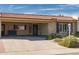 Well-maintained single-story home with a tile roof, covered carport, and desert landscaping for low maintenance at 5110 N 78Th St, Scottsdale, AZ 85250