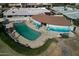 Aerial view of a community pool surrounded by seating areas and well-manicured landscaping at 5110 N 78Th St, Scottsdale, AZ 85250