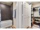 Well-organized bathroom featuring storage shelves and a shower/tub combo at 5303 N 7Th St # 114, Phoenix, AZ 85014