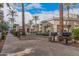 Community pool with outdoor grills, covered picnic areas and palm trees at 5303 N 7Th St # 114, Phoenix, AZ 85014