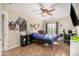 Bedroom with a ceiling fan and neutral walls at 5331 N Pajaro Ct, Litchfield Park, AZ 85340