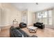 Bright living room showcasing vaulted ceilings, natural light, and an open layout, perfect for gatherings at 5331 N Pajaro Ct, Litchfield Park, AZ 85340