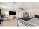 Large main bedroom featuring a ceiling fan, neutral walls, and carpet flooring at 5331 N Pajaro Ct, Litchfield Park, AZ 85340