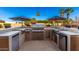 Entertain with ease in this backyard featuring a complete outdoor kitchen and stainless steel appliances at 5331 N Pajaro Ct, Litchfield Park, AZ 85340