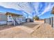 Backyard with shed and gravel at 53974 W Barrel Rd, Maricopa, AZ 85139