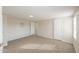 Bright bedroom with carpet, a window letting in natural light, and calming decor at 53974 W Barrel Rd, Maricopa, AZ 85139