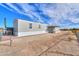 View of single-story home with a fenced yard and desert landscaping at 53974 W Barrel Rd, Maricopa, AZ 85139