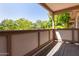 This cozy balcony provides a relaxing outdoor space with views of lush greenery at 616 S Hardy Dr # 220, Tempe, AZ 85281