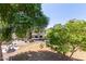 Exterior view of a two-story condo with mature landscaping and common areas at 616 S Hardy Dr # 220, Tempe, AZ 85281