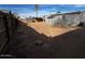 Wide shot of the backyard with a shed and perimeter fencing at 619 W Cocopah St, Phoenix, AZ 85003