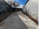 Long driveway that leads to a backyard shed at 619 W Cocopah St, Phoenix, AZ 85003